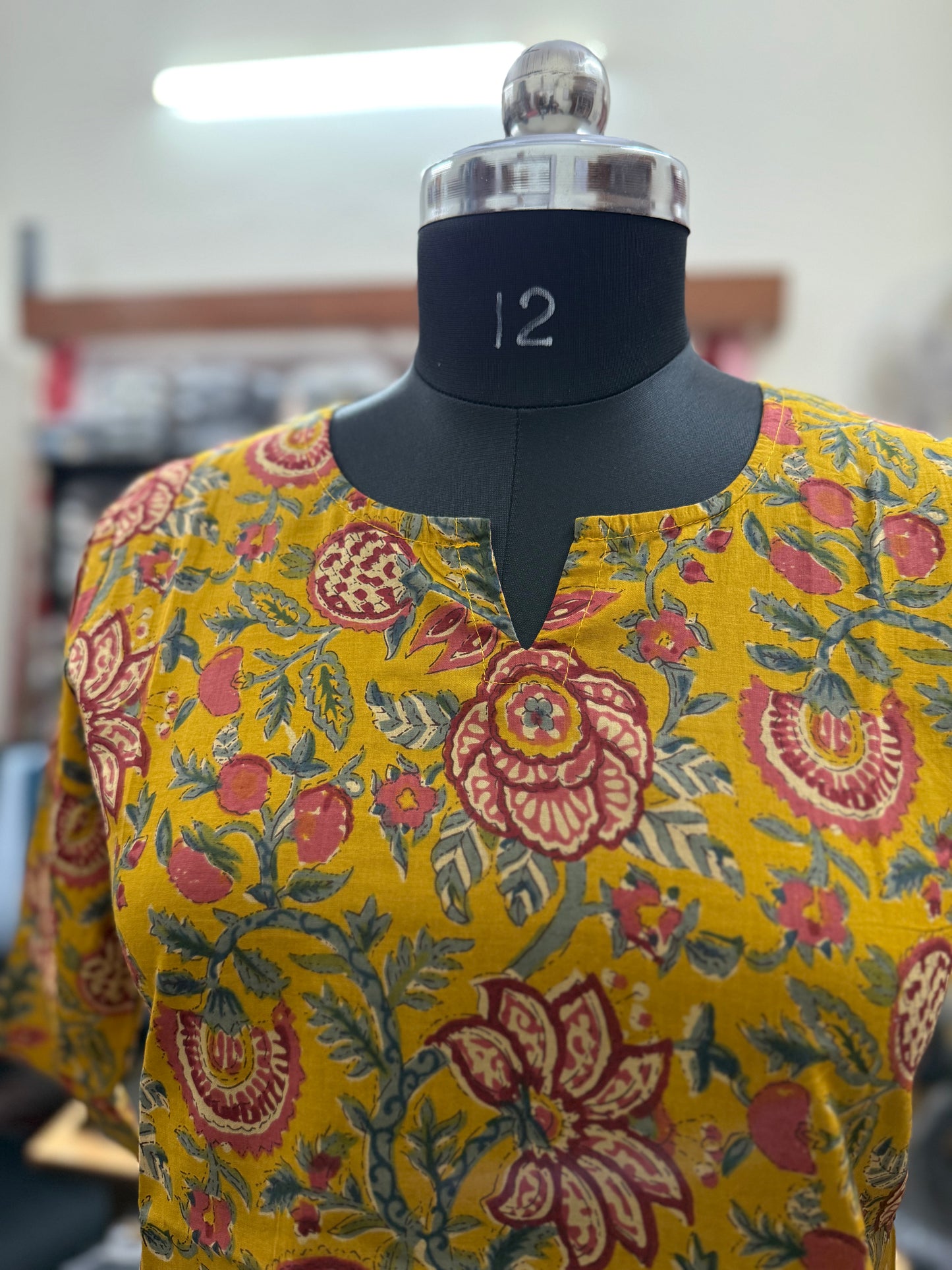 Mustard Yellow Kalamkari Floral Print Cotton Short Kurti for Women